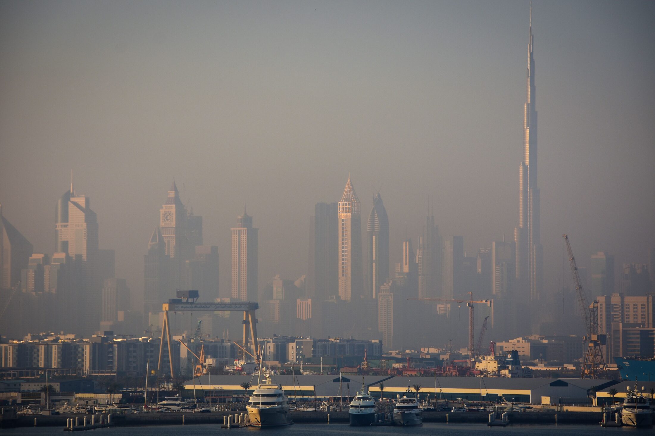 Dubai skyline in morning haze above the Drydocks waterfront